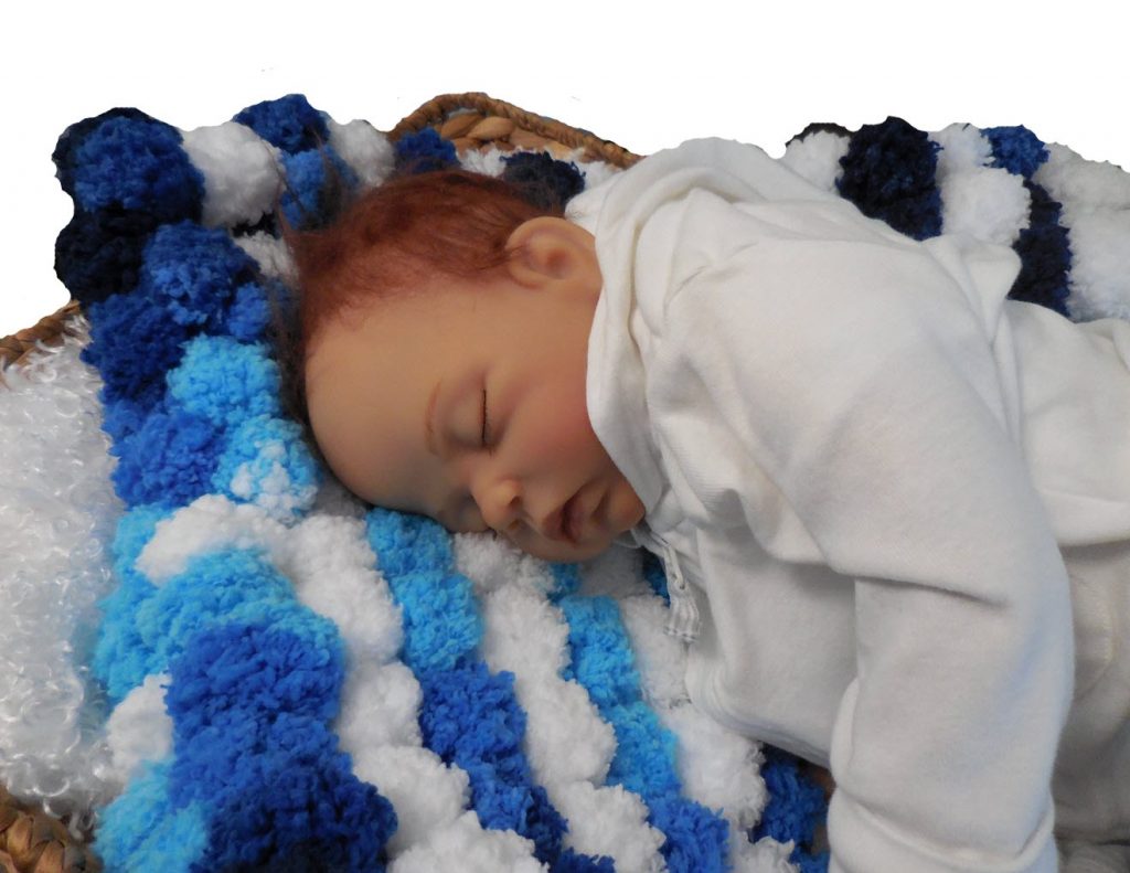 blues and white pompom photo prop